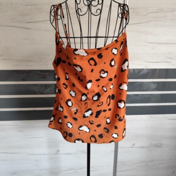 L/XL (44/46) – Narancssárga mintás trikófelső
