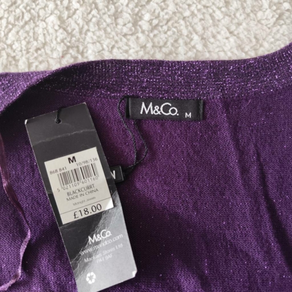 M (38) – Lila boleró