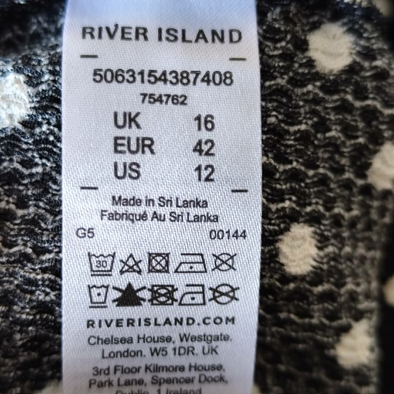 L (42) – Fekete pöttyös nadrág